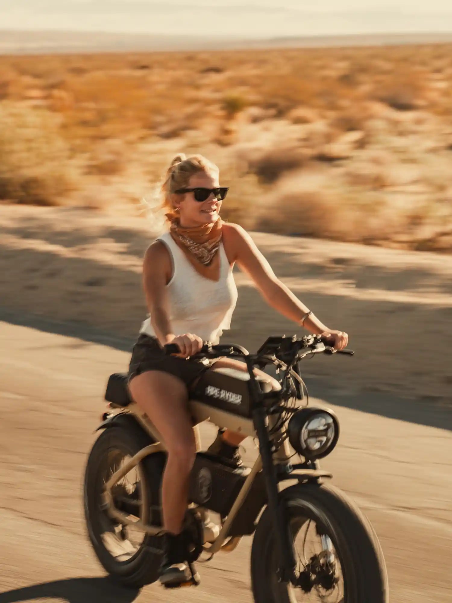 woman riding her ape ryder electric bike