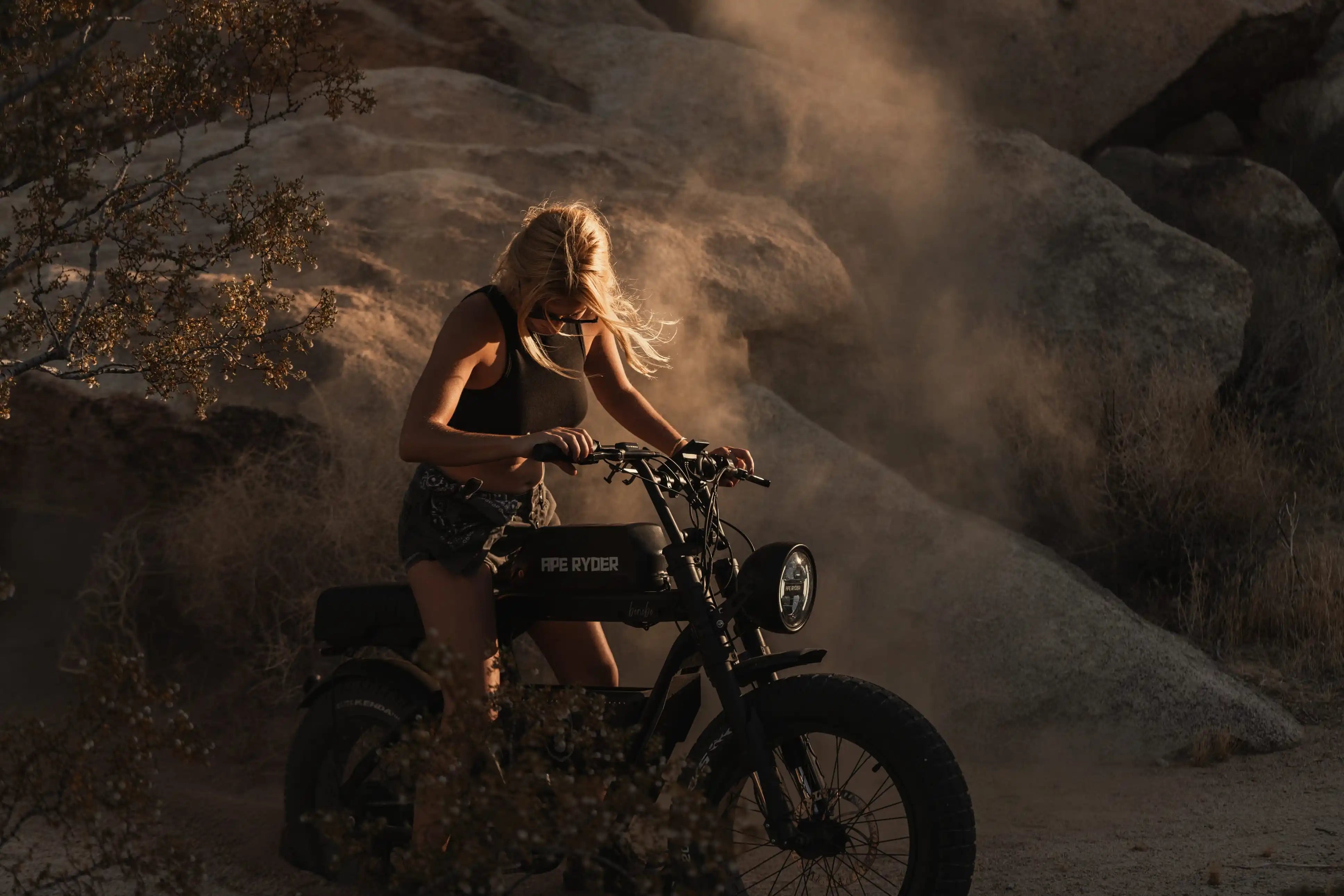 woman riding e-bike in the desert , off road e-bike